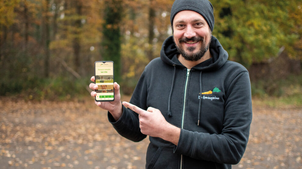 Daniel Joachim von den Gemüsegärtnern präsentiert die neue App. Foto: Katharina Uhlmann, Die Gemüsegärtner